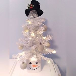 White snowman lighted christmas tree